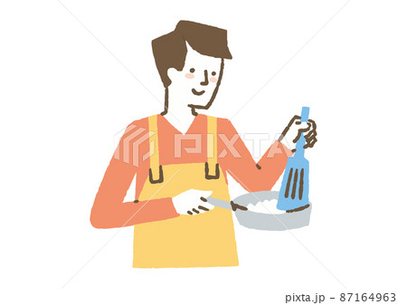 エプロンをして料理をする男性_色 87164963