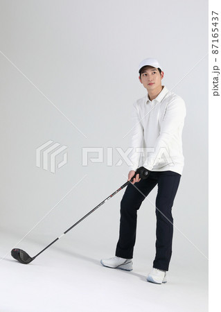 golf sports player, asian korean man with golf club in studio 87165437