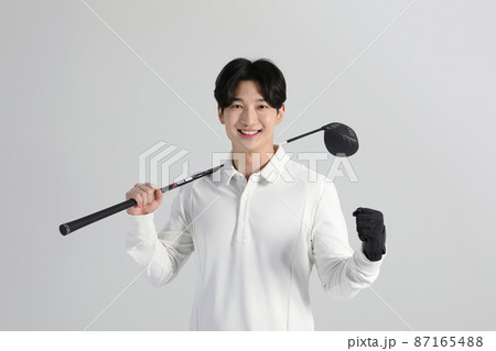 golf sports player, asian korean man with golf club in studio 87165488