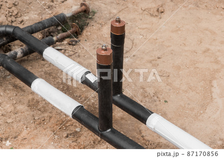 Repair of the water line of the heating main pipe in the ground trench pipeline at the construction site work industry Repair of the water line of the heating main pipe in the ground trench pipeline at the construction site work industry 87170856