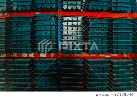 Gold mining storage rock core samples geology drilling industy. Large ore warehouse in modern industry, ores stacked in boxes. Selective focus  87178044
