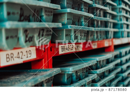 Gold mining storage rock core samples geology drilling industy. Large ore warehouse in modern industry, ores stacked in boxes. Selective focus  87178080