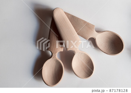 Handmade Wooden Spoons for hiking and outdoor activities. Craftsmanship and artisan concept 87178128