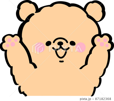 両手を上げて喜ぶ茶色の犬 87182368