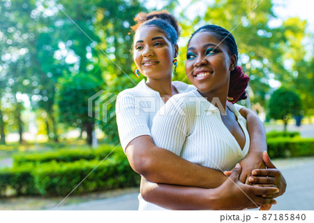 happy african american one gender couple in love dating outdoors in summer park 87185840