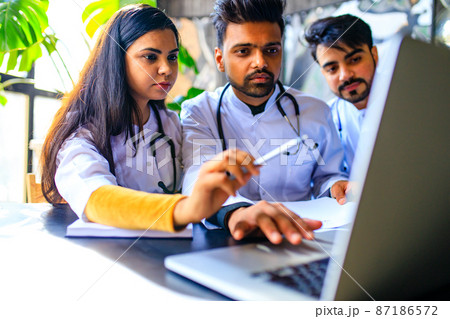 indian medic students practicing in sun classroom 87186572