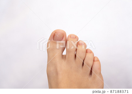 Closeup of female feet and toes. Healthy feet concept 87188371