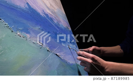 Artist copyist paint seascape with ship in ocean. Craftsman decorator draw as boat sail on blue sea with acrylic oil color. Draw brush, knife palette. Artist copyist paint seascape with ship in ocean. Craftsman decorator draw as boat sail on blue sea with acrylic oil color. Draw brush, knife palette. 87189985