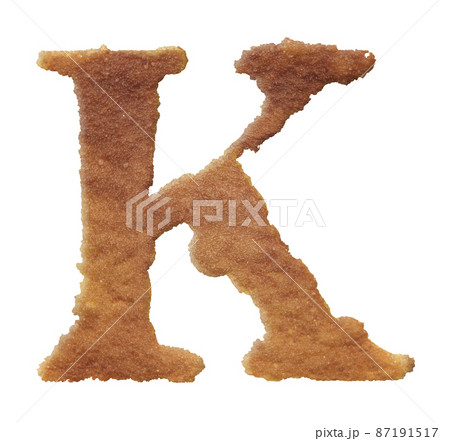Rusty coarse baked sand letter isolated on white background. 87191517