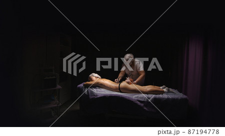 Woman Receiving Vacuum Cupping Device, Butt Skin Lifting Therapy Pump Lifting Enhancer Cup Machine Massager, Beauty Tool, Salon SPA, Hip Shaping 87194778