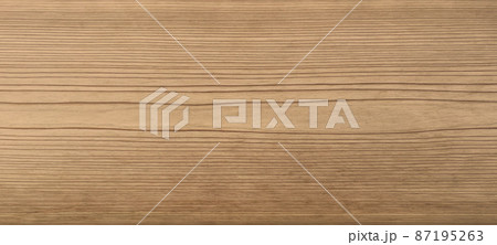中杢目の木目が表れた灰茶色の横長の板材の背景画像 87195263