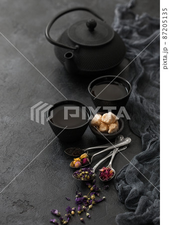 Rose buds,blue mallow flowers,green and black loose tea with sugar and Chinese teapot  87205135