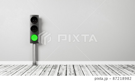 Green Traffic Light in the Room with Copy Space 87218982