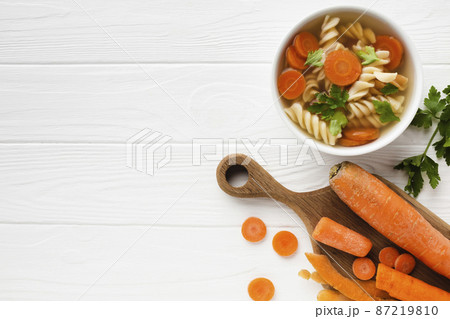 flat lay fusilli broccoli carrots bowl with copy space 87219810