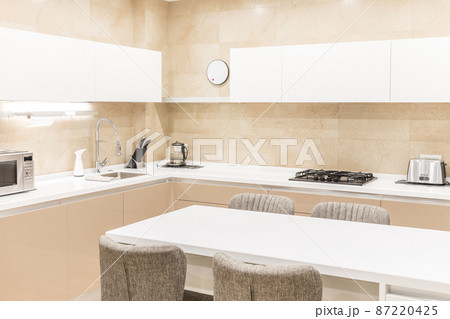 Modern new kitchen in a luxurious apartment Modern new kitchen in a luxurious apartment 87220425