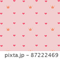 Pattern of pink hearts and golden yellow crowns on a light pink background, vector image 87222469