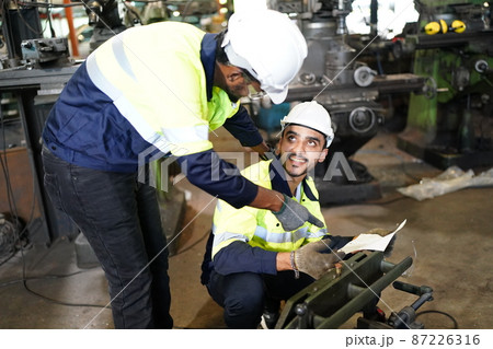 Professional men engineer worker skills quality, maintenance, training industry factory worker , warehouse Workshop for factory operators, mechanical engineering team production. 87226316