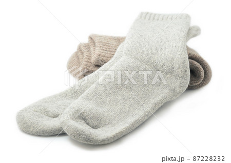 grey sheep wool socks isolated on a white background grey sheep wool socks isolated on a white background 87228232