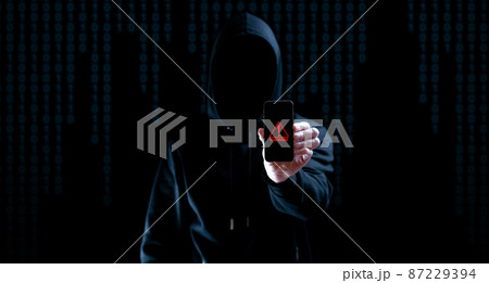 Cyber security hacker smartphone. Internet web hack technology. Digital mobile phone in hacker man hand isolated on black banner. Data protection, secured internet access, cybersecurity. 87229394