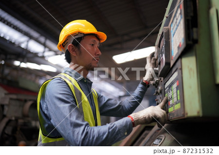 Industrial Engineers in Hard Hats.Work at the Heavy Industry Manufacturing Factory. 87231532