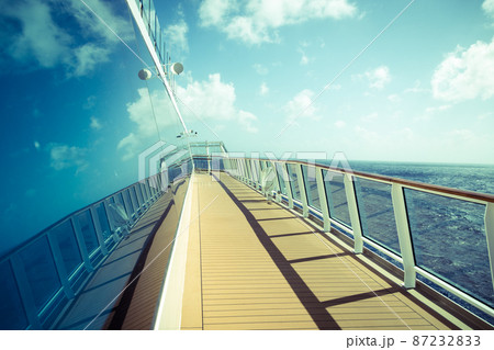 Cruise ship empty open deck with copy space, blue tone Cruise ship empty open deck with copy space, blue tone 87232833