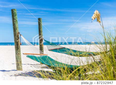 Hammock on a beach 87232947