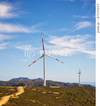 Turbines in a mountain wind farm. Ecological energy production. 87235037