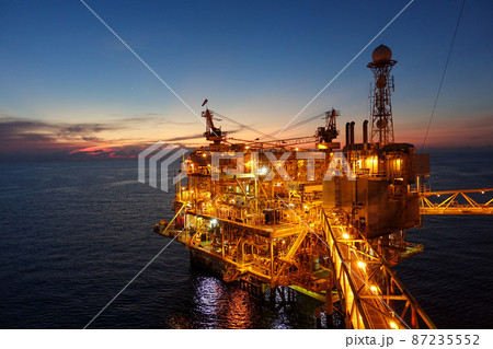 platform for exororation and production oil and gas with bridge in evening time for power energy of the wolrd concept 87235552