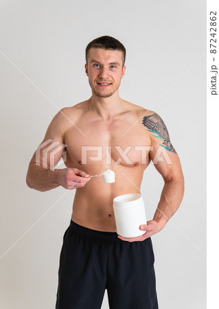 Fitness protein jars white on white background bodybuilder powder strong high ache painful, ill person caucasian young stress, human Hold red care, lower suffer attractive Fitness protein jars white on white background bodybuilder powder strong high ache painful, ill person caucasian young stress, human Hold red care, lower suffer attractive 87242862