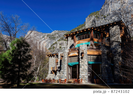 Sunny exterior view of the The Ahwahnee hotel in Yosemite National Park 87243102