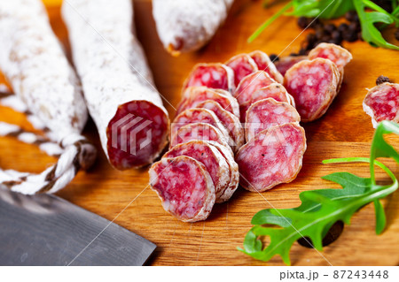 Sliced spanish sausage fuet 87243448