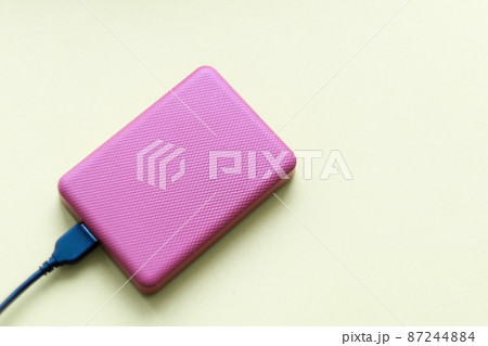 External hard drive disc with usb 3.0 cable. data storage on portable hdd. backup of important data. copy space External hard drive disc with usb 3.0 cable. data storage on portable hdd. backup of important data. copy space 87244884