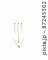 The figure laid out from matches on a white background. Isolate. Symbol. Smile. 87245562