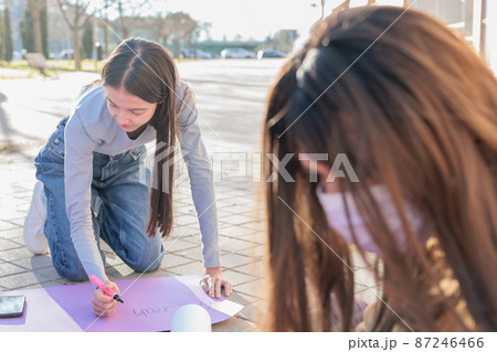 group of multicultural women prepare banner for 8 march break the bias womens international day 87246466