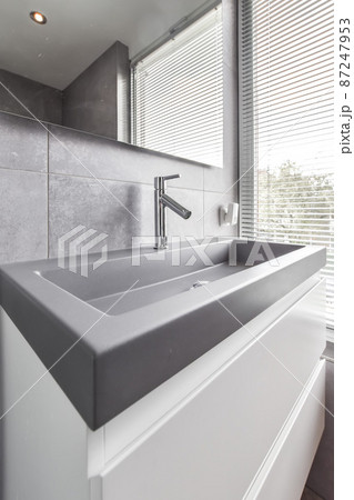 Bathroom with sink and panoramic window in gray style 87247953