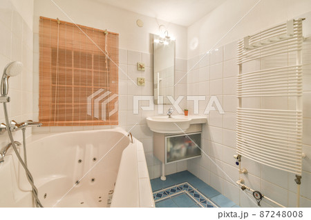 Luxury interior design of a bathroom with marble walls Luxury interior design of a bathroom with marble walls 87248008