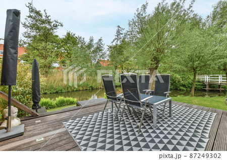 Large house with a garden in the backyard 87249302