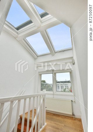 Luxury staircase hall of special design in an elegant house Luxury staircase hall of special design in an elegant house 87250097