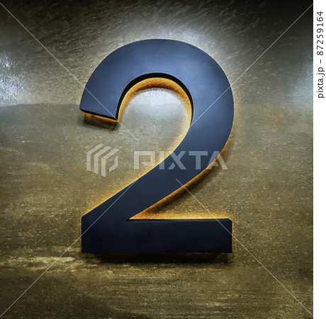 Metal Number two 2 on a wooden wall Metal Number two 2 on a wooden wall 87259164