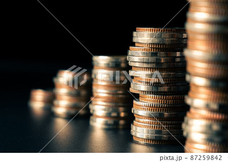 Pile of gold coins money stack in finance treasury deposit bank account saving Pile of gold coins money stack in finance treasury deposit bank account saving 87259842