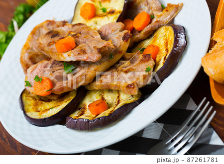 Roasted lamb meat with grilled eggplant Roasted lamb meat with grilled eggplant 87261781