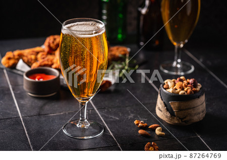 Glass of light beer 87264769