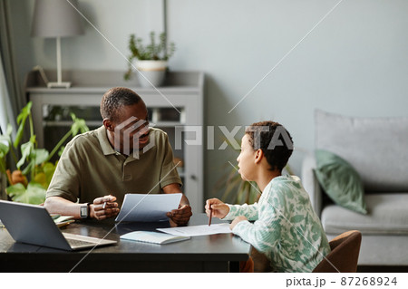 Girl Studying at Home with Father Girl Studying at Home with Father 87268924