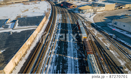 Winter railyard with snow during the day Winter railyard with snow during the day 87270701