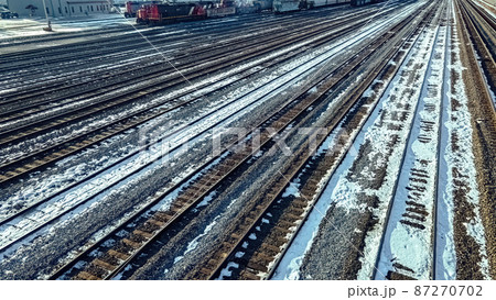 Winter railyard with snow during the day Winter railyard with snow during the day 87270702