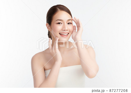 Beautiful young asian woman with clean fresh skin on white background, Face care, Facial treatment, Beautiful young asian woman with clean fresh skin on white background, Face care, Facial treatment, 87277208