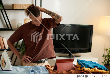 Stressed Man Working From Home Stressed Man Working From Home 87280476