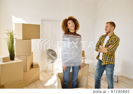 Newlyweds fooling around while moving to house Newlyweds fooling around while moving to house 87280885