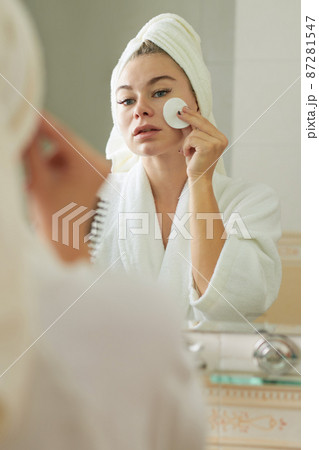 Woman Applying Face Toner 87281547