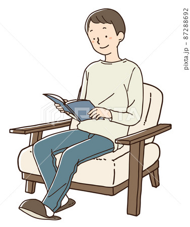 白いソファに座り読書をする男性 白いソファに座り読書をする男性 87288692